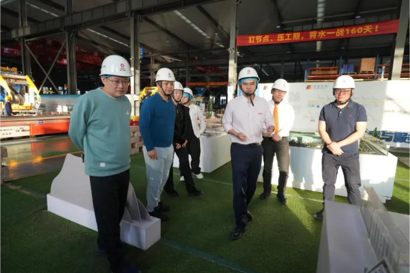 The Nan'an Returned Overseas Students Association visited and conducted research at Quangong Machinery Co., Ltd.